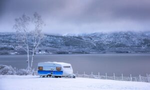 Caravan in winter landscape